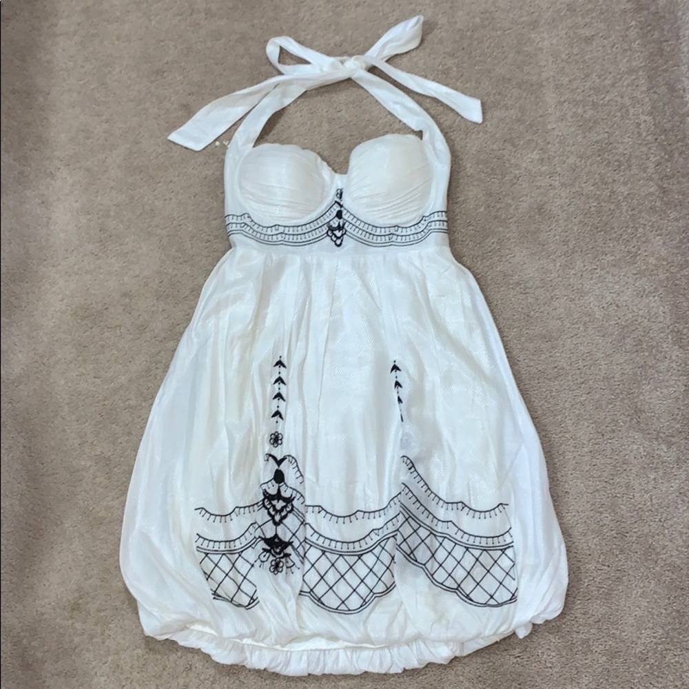 White bustier bubble hem dress